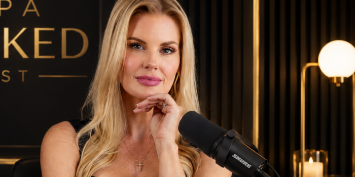 aj-podcast-seated-hand-propped-cropped